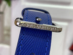 Blue leather strap with metal hardware engraved Louis Vuitton.