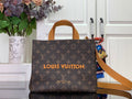 Louis Vuitton tote bag in brown monogram canvas with tan leather handles and strap.