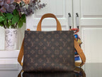 Tote bag with brown monogram canvas and tan leather top handles, front view.