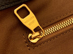 Louis Vuitton bag zipper pull and track with gold hardware detail