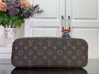 Louis Vuitton monogram handbag with top zipper and smooth brown body