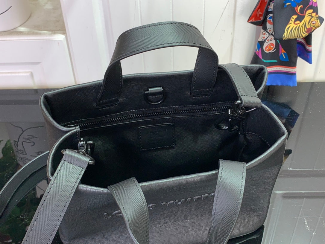 Louis Vuitton tote bag open top with interior pockets and light gray handles