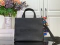 Louis Vuitton leather tote bag with top handles, black, embossed logo front