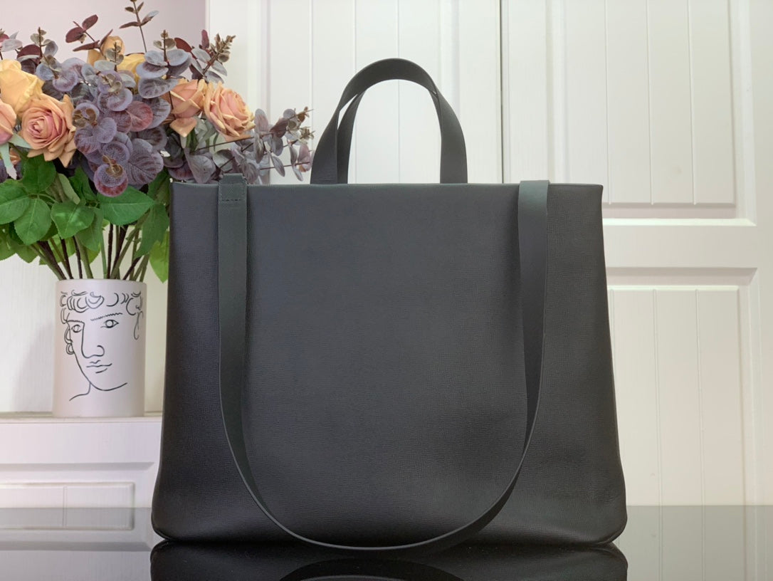 Tote bag with structured silhouette and dark gray leather, front panel and handles
