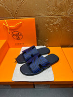 Blue and dark stripe slide sandals with black toe strap