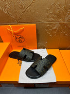 Hermes luxury slide sandals, dark patterned straps and open back