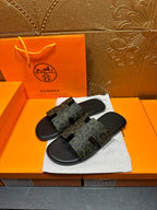 Hermes luxury slide sandals, single wide strap with dark patterned print