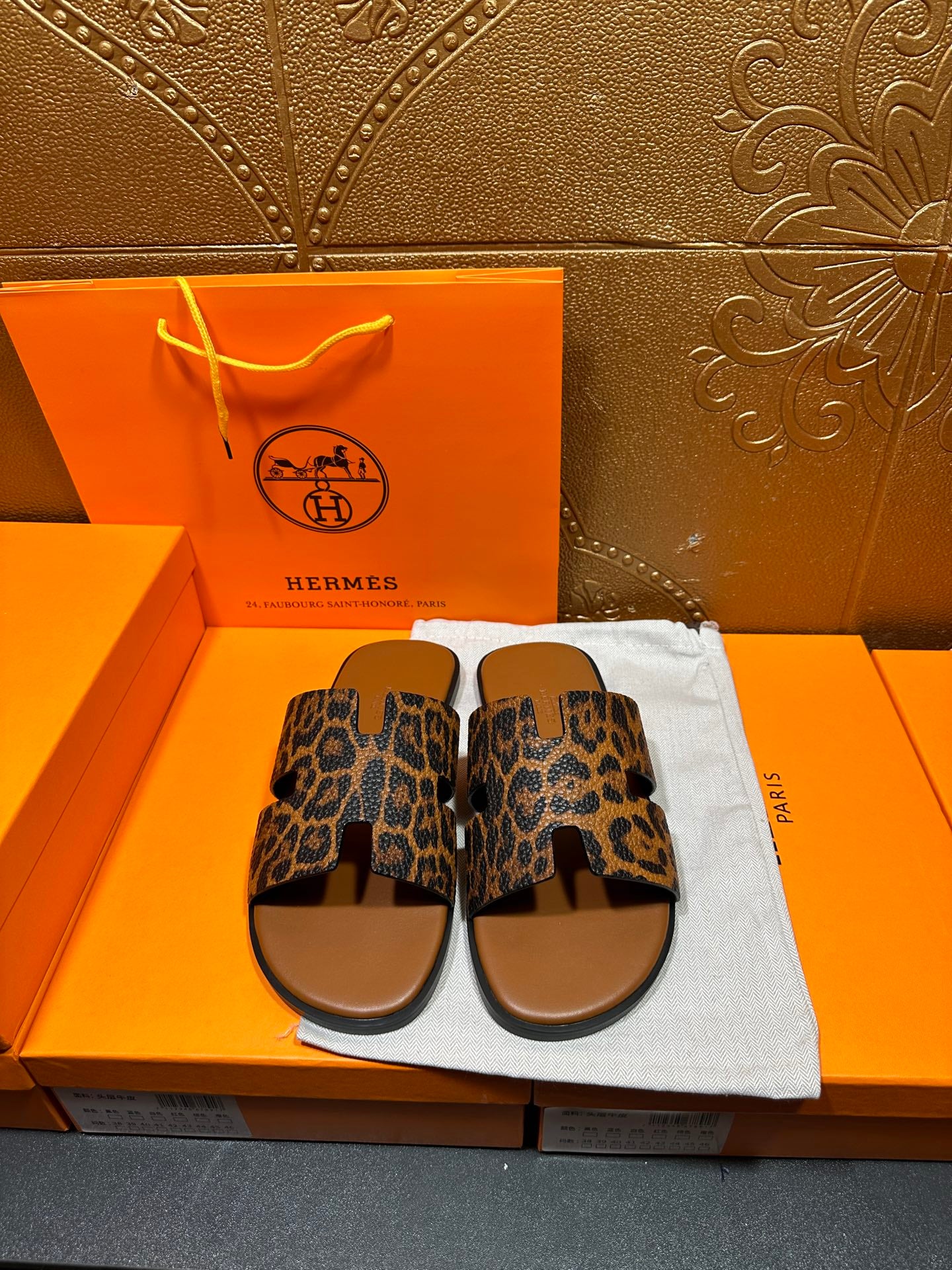 Hermes leopard-print slide sandals with wide crossover straps