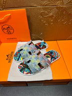Patchwork Hermes slide sandals, multicolor fabric straps with light blue and graphic pattern