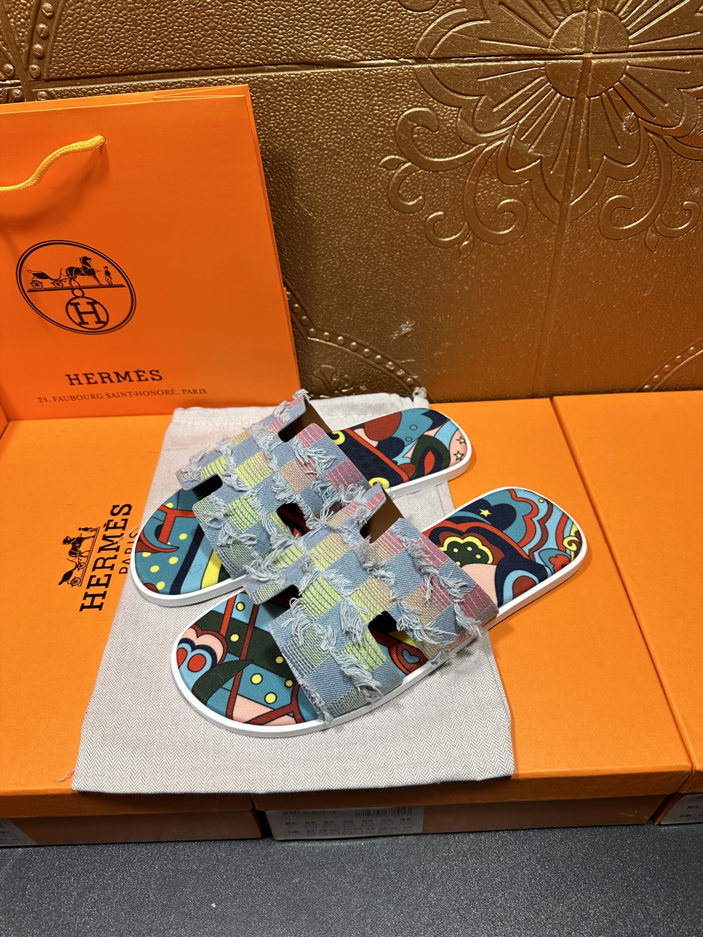 Patchwork Hermes slide sandals, multicolor fabric straps with light blue and graphic pattern