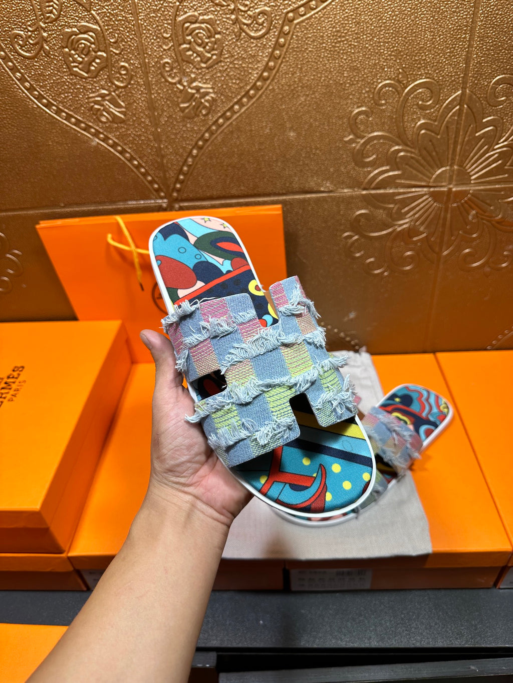 Handheld Hermes patchwork slide sandal, multicolor graphic fabric straps on light blue base