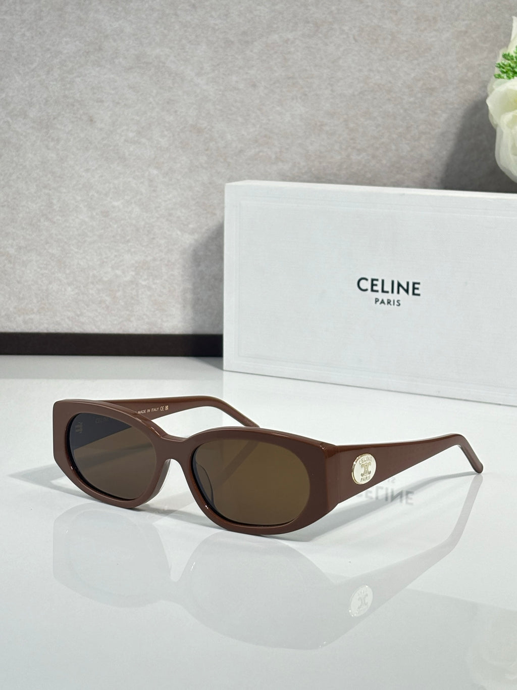 Celine oval sunglasses, brown frame with dark brown lenses and gold logo detail