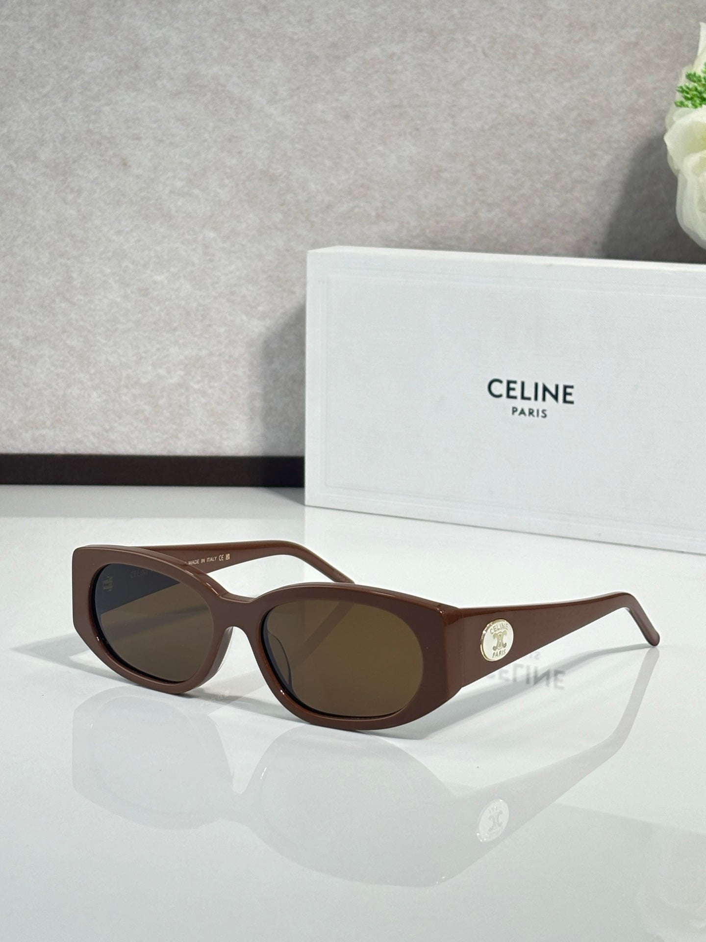 Celine oval sunglasses, brown frame with dark brown lenses and gold logo detail