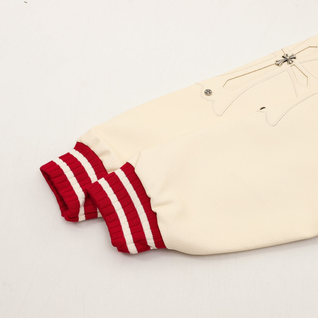 Cream sleeve panel with red ribbed striped cuff and button detail