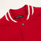 Red varsity jacket collar with ribbed striped trim and button placket