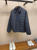 Dark blue long puffer jacket with full front zipper and stand collar