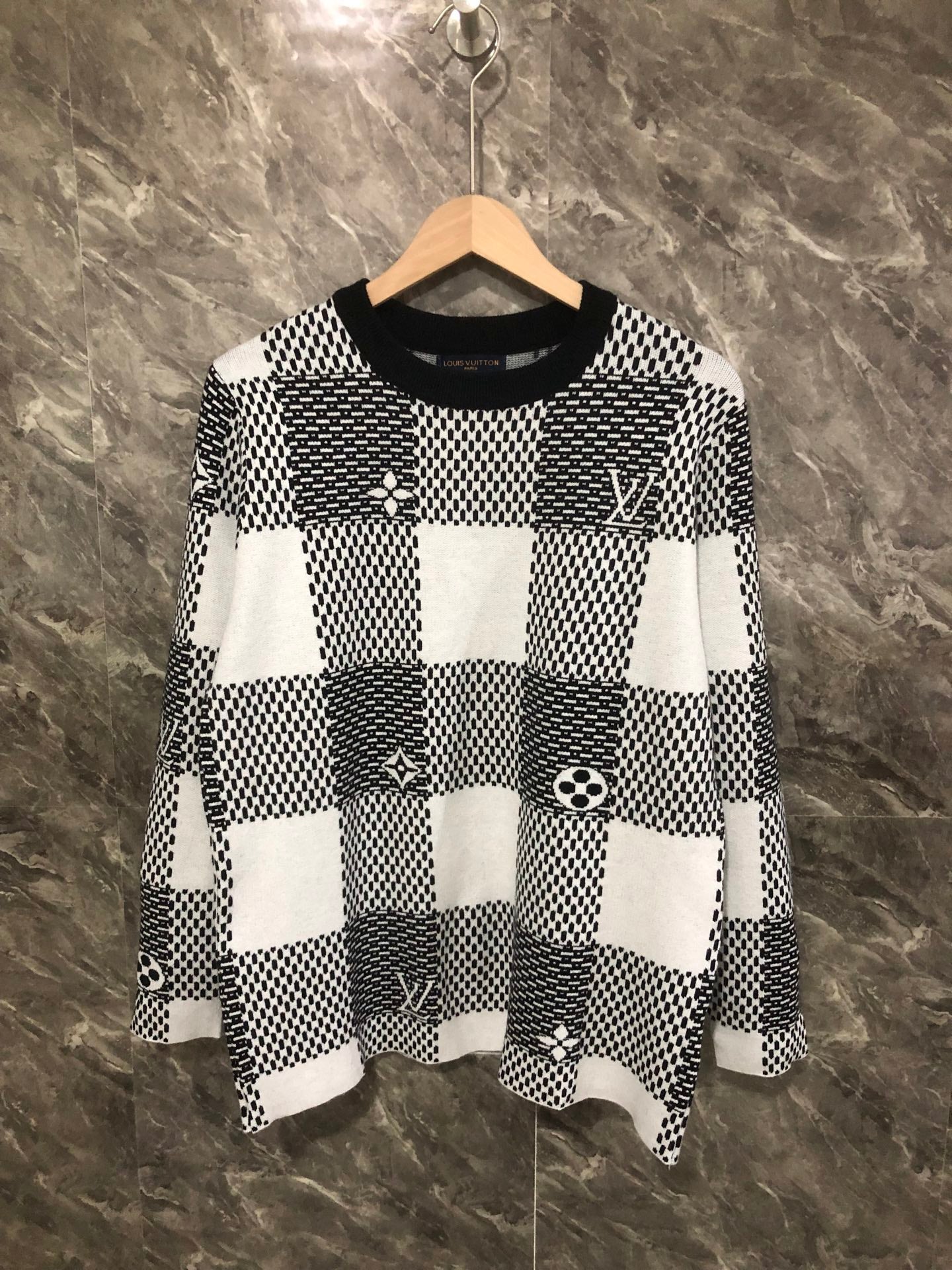Long-sleeve sweater in black-and-white check knit with Louis Vuitton motifs