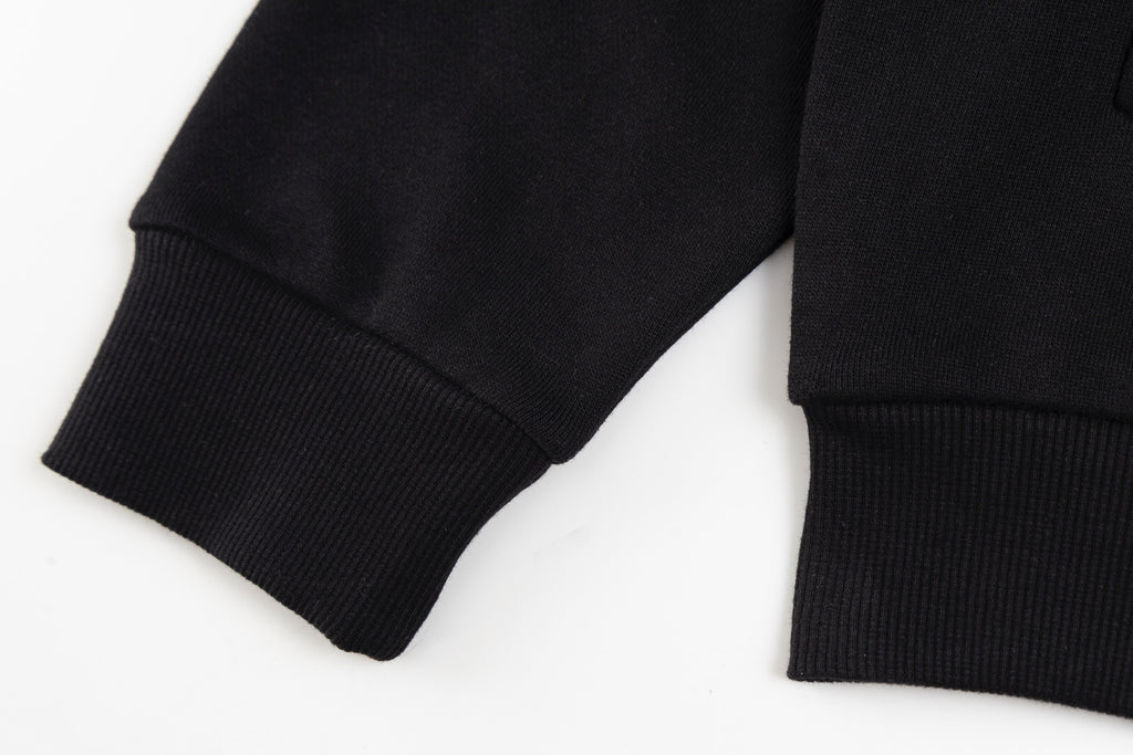 Black long-sleeve hoodie cuffs and ribbed hem