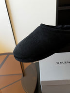 Balenciaga dark suede mule with plush collar and smooth side profile