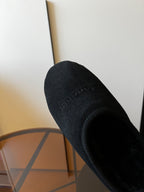 Balenciaga dark suede mule close-up of side and plush lining interior