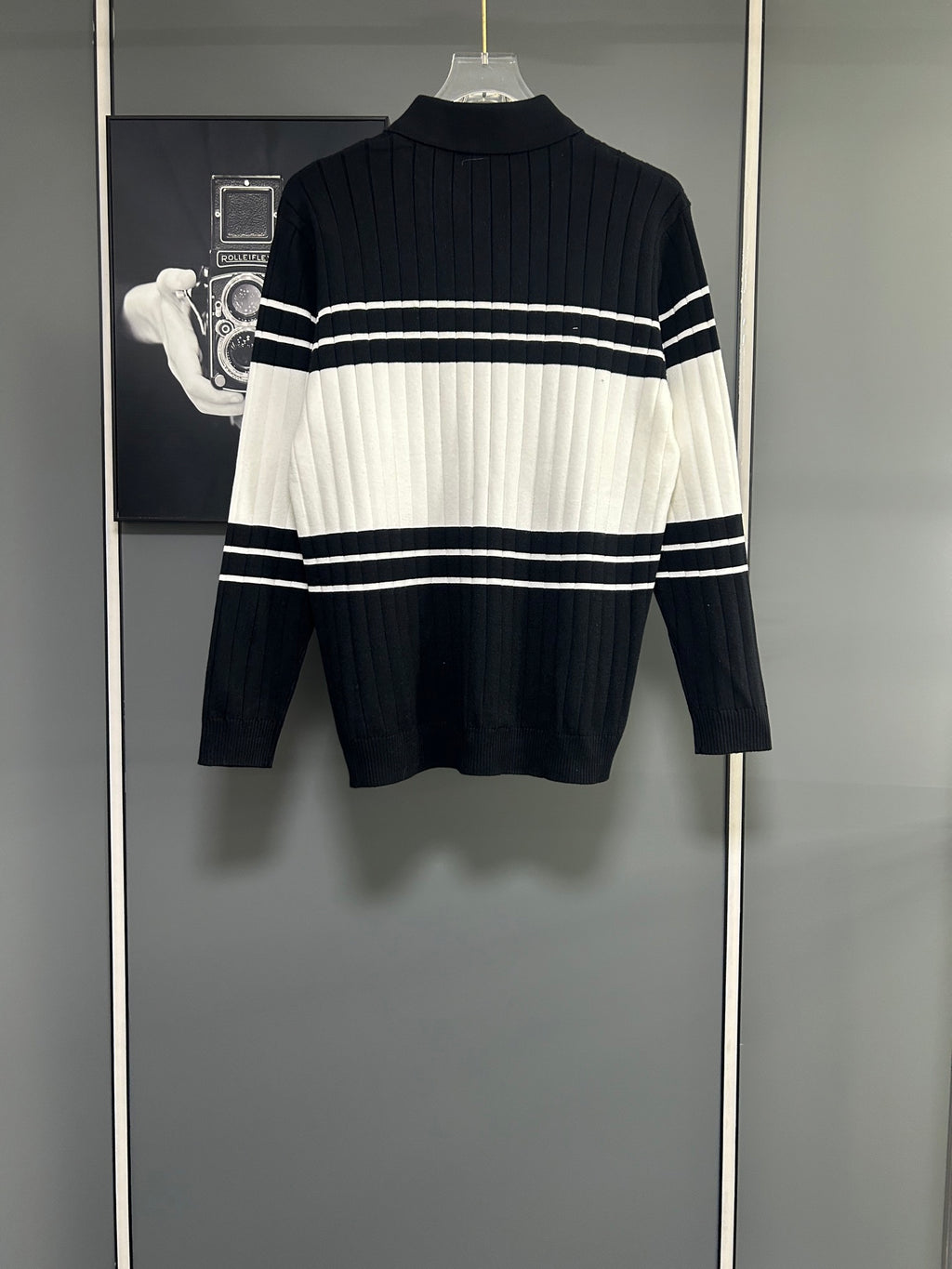 Dior long-sleeve knit polo sweater, back view with black-and-white stripe bands