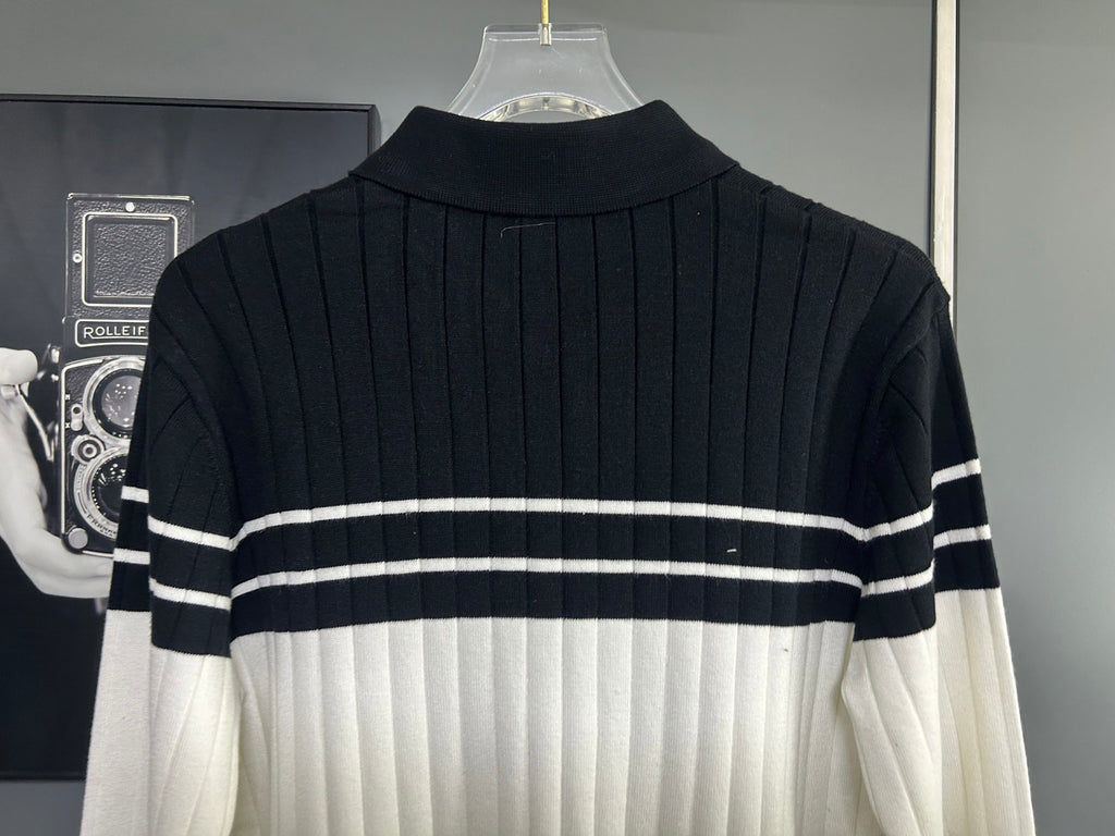 Long-sleeve knit polo sweater back view with black and white striped rib knit