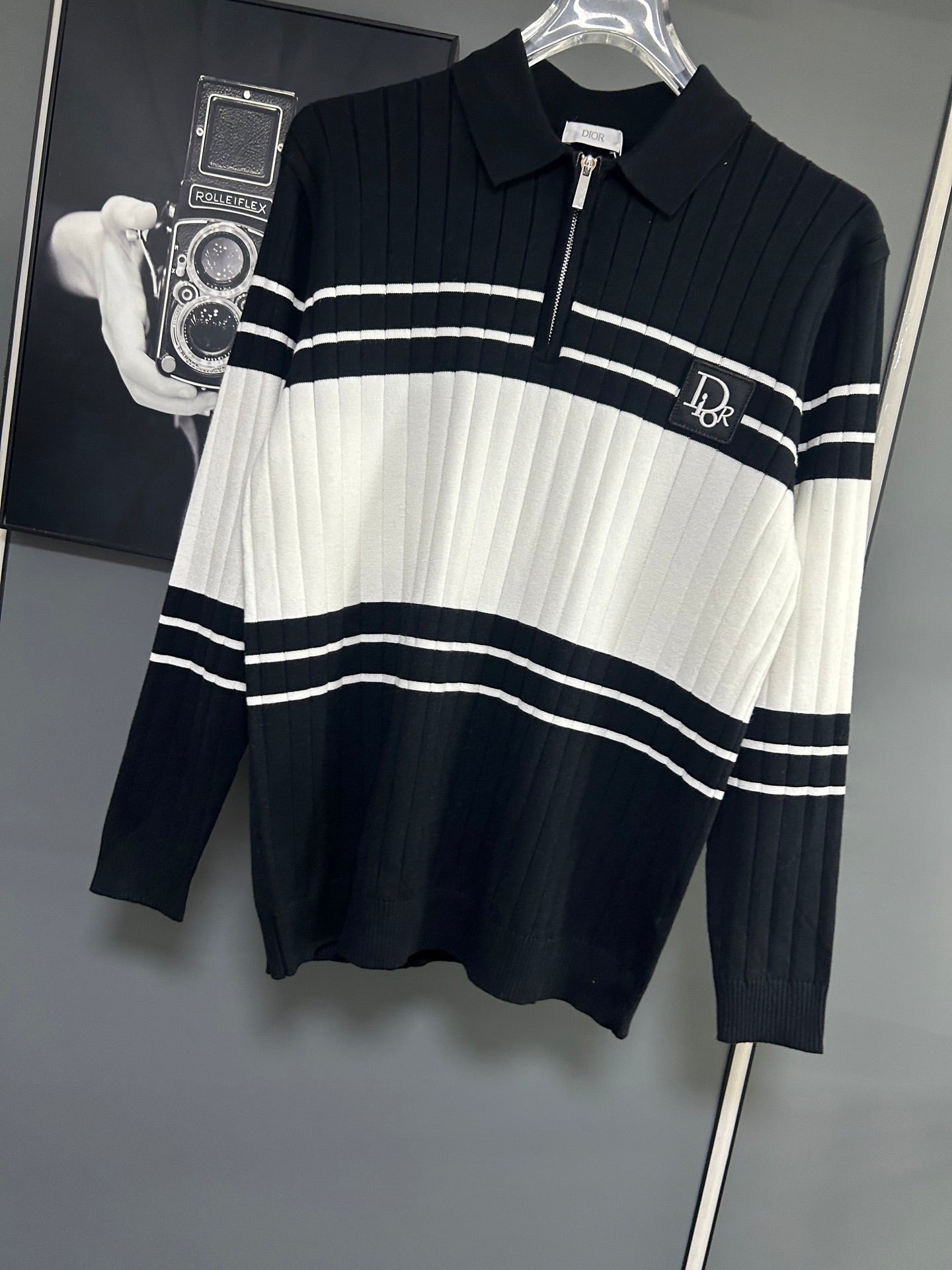Dior long-sleeve knit polo sweater in black and white with horizontal stripe pattern