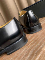 Dior unisex oxford dress shoes heel close-up, black leather with embossed DIOR