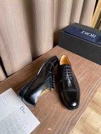 Dior unisex lace-up oxford dress shoes, black leather, side and heel view