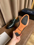 Dior unisex lace-up dress shoes with orange interior insole and green metallic upper