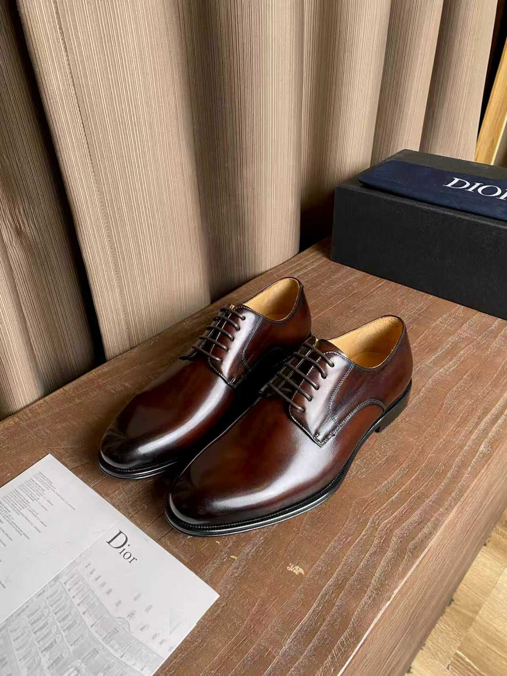 Dior unisex leather oxford shoe toe and laces in dark brown, close-up