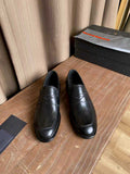 Prada unisex black leather penny loafers, stitched rounded toe and low heel