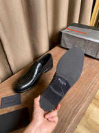 Prada unisex loafer sole with Prada logo patch and cushioned insole