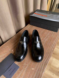 Prada unisex black leather loafers, slip-on with stitched moc toe and logo badge