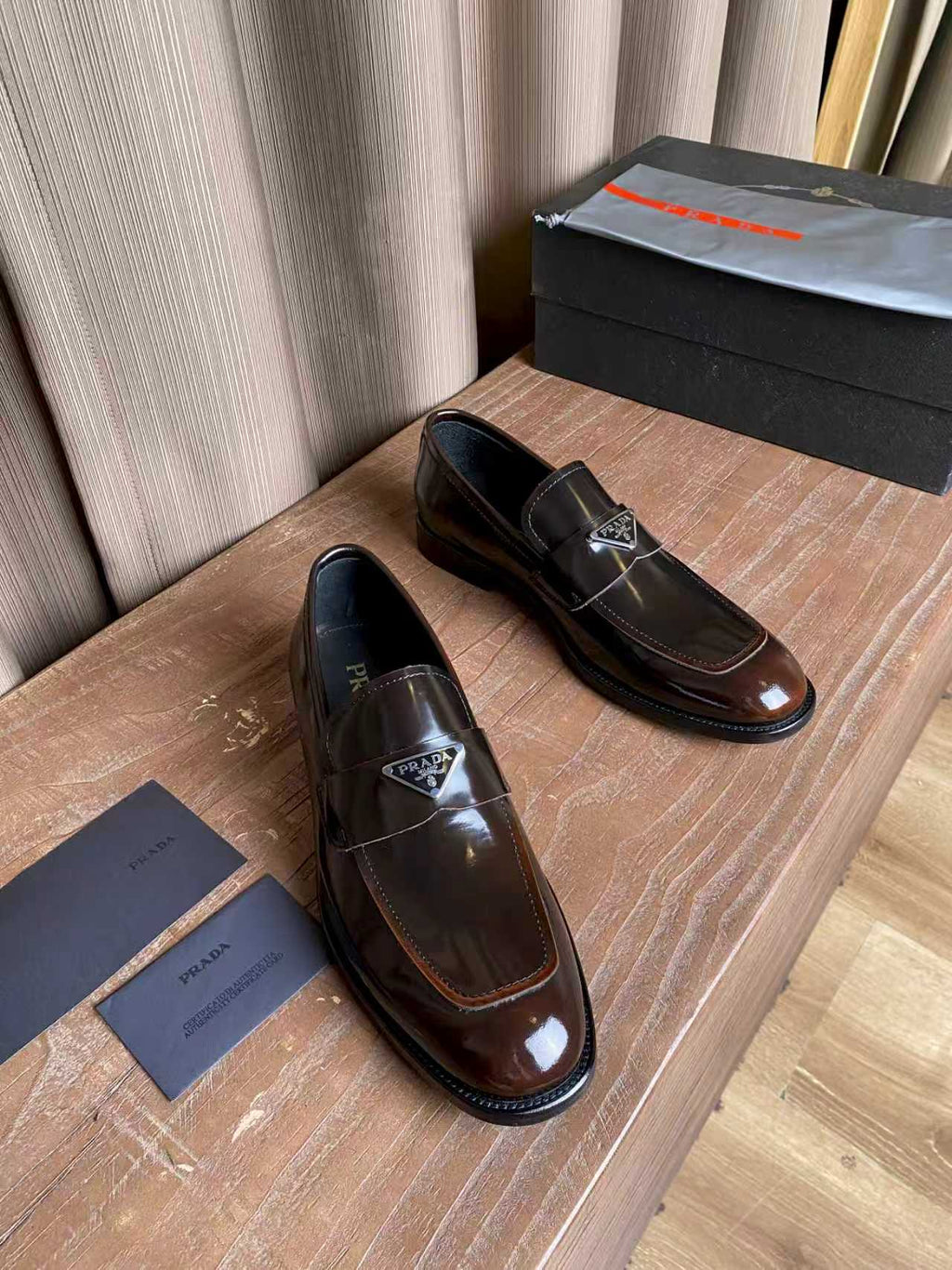 Prada unisex leather loafers, dark brown slip-on shoes with logo hardware