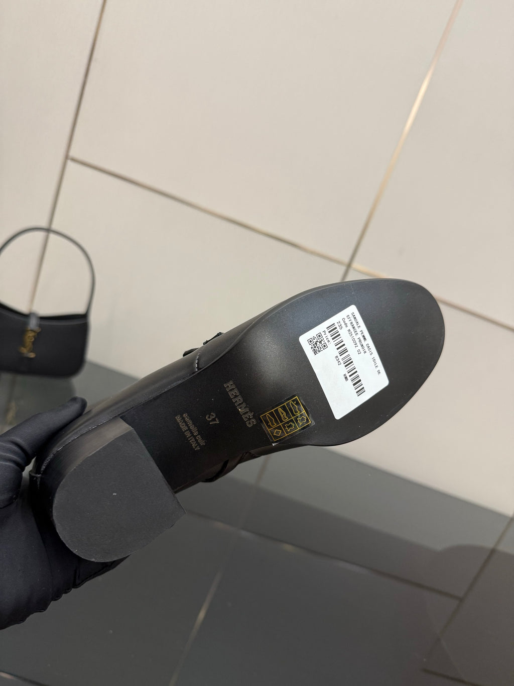 Hermes ladies black leather boot outsole with brand and size label, underside