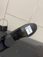 Hermes ladies black leather boot outsole with brand and size label, underside