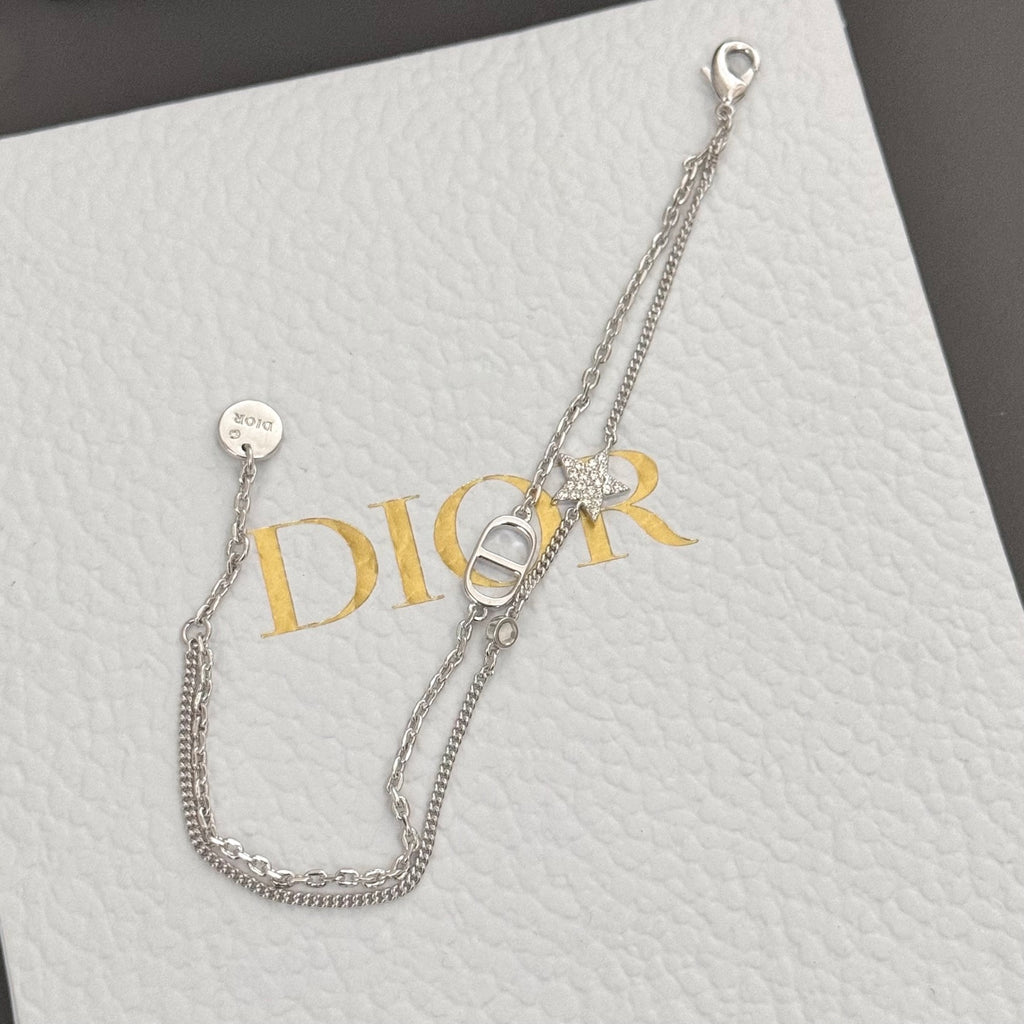 Silver-tone necklace with DIOR pendant and small round disc charm