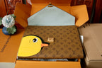 Louis Vuitton monogram bag with yellow bird applique and hinged flap