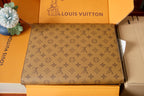 Louis Vuitton monogram envelope bag with flap closure