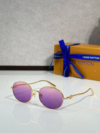 Louis Vuitton round sunglasses with gold frame and purple lenses