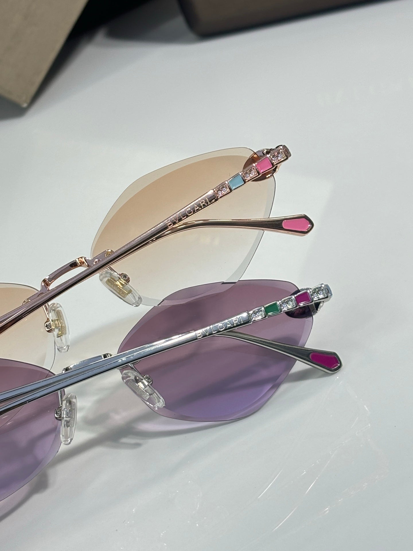 Bvlgari purple gradient sunglasses with gem-accented metal temples and gold frame