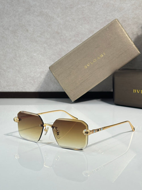 Bvlgari glasses, gold metal rectangular frames with warm brown tinted lenses and jeweled temples