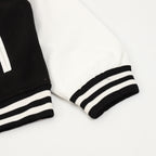 Burberry bomber jacket sleeve cuffs with black-and-white striped ribbing