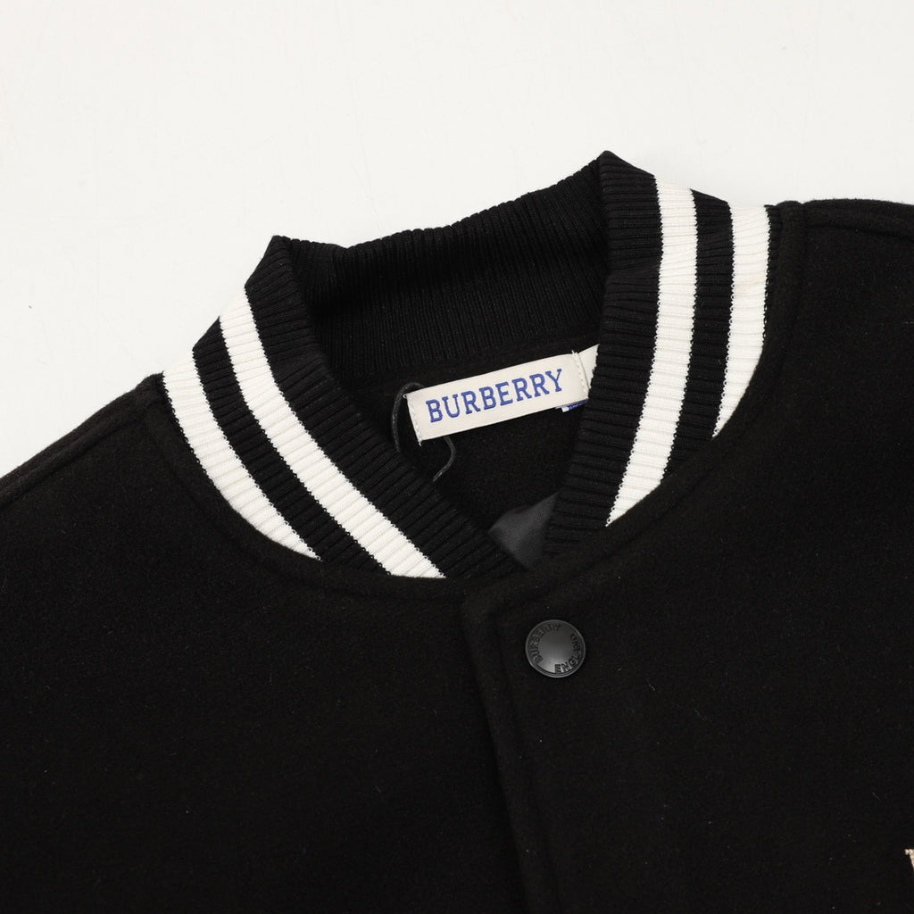 Burberry bomber jacket neckline with striped ribbed collar and button placket
