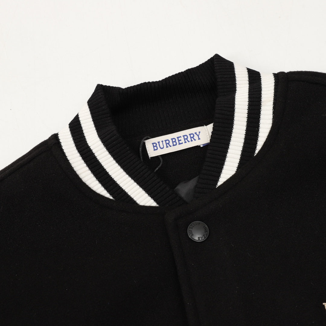 Burberry bomber jacket neckline with striped ribbed collar and button placket