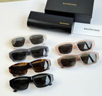 Assorted sunglasses set with dark lenses and Balenciaga logo temples