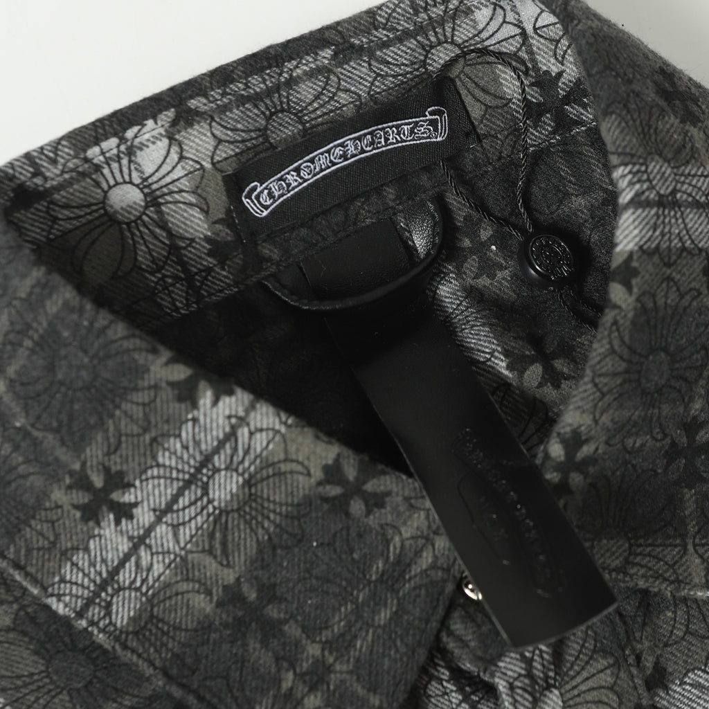 Dark gray patterned button-up shirt chest panel with label and buttons