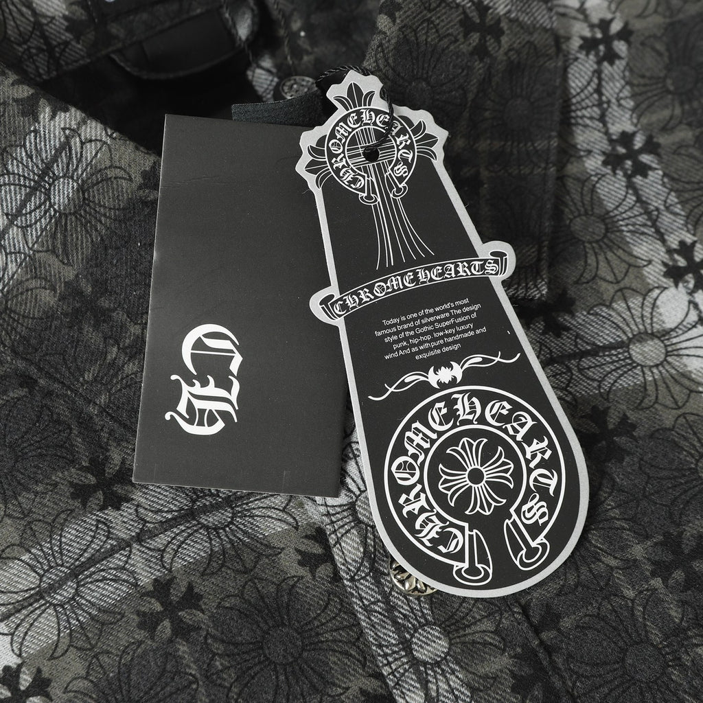 Dark gray button-up shirt packaging label and tag on patterned fabric
