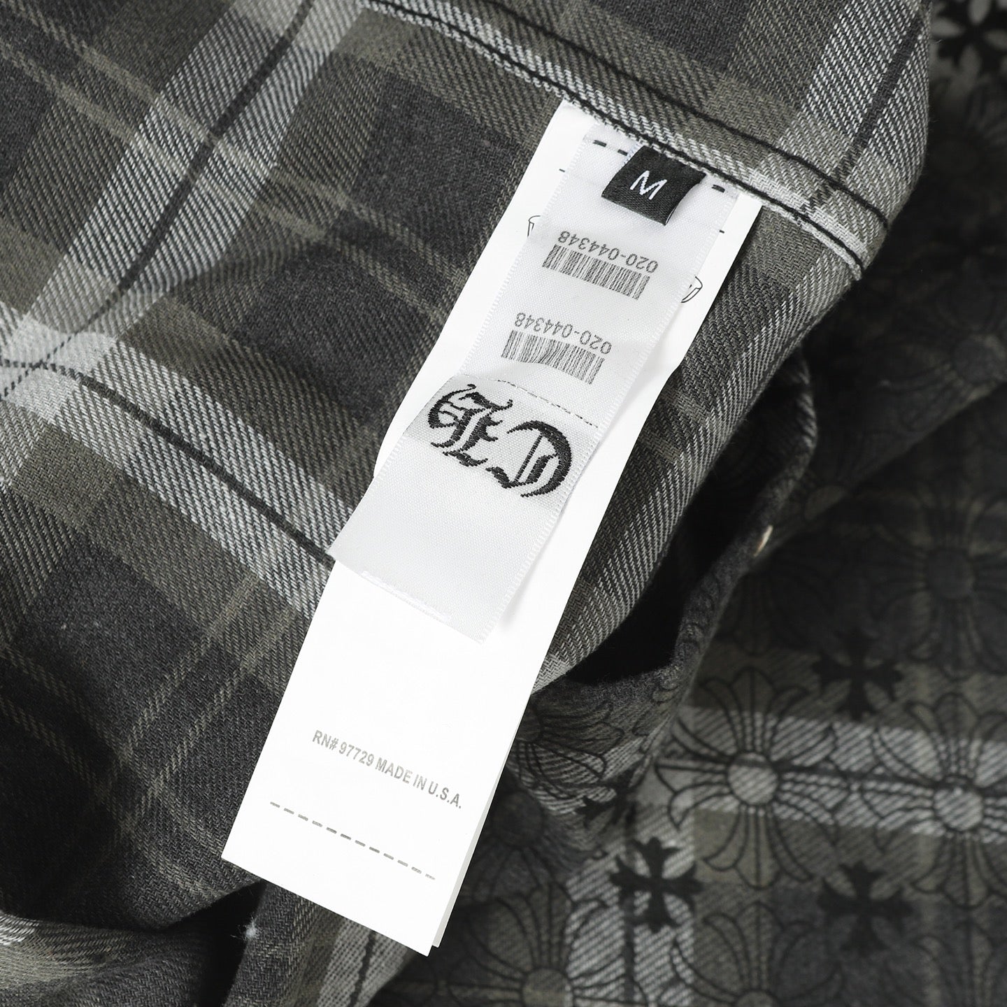 Dark plaid long-sleeve button shirt with size label